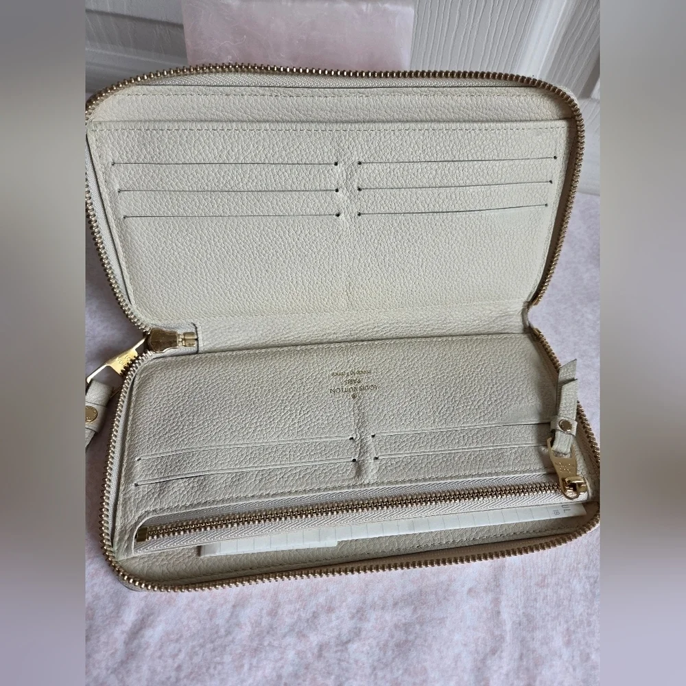 Louis Vuitton Secret Long Wallet – Monogram Empreinte Ivory Leather Authentic